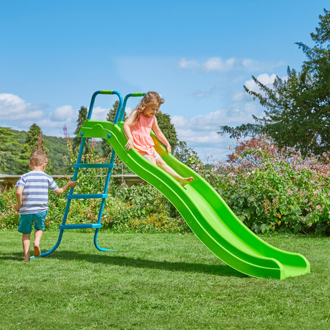 Two children playing on a Crazywavy garden slide