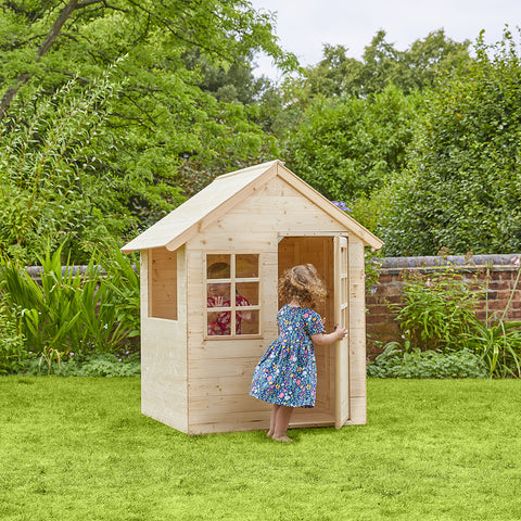 Two children playing in playhouse