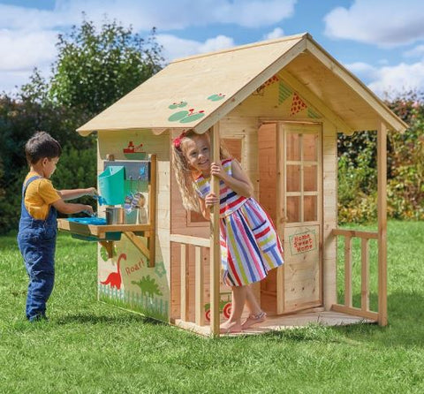 Kids playing outdoors in a wooden playhouse