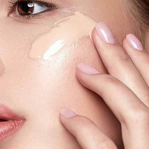 Use a tinted moisturizer or sheer foundation to even out your skin tone without weighing it down.