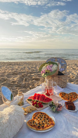 Beach picnic is a memorable activity, combining delicious food, scenic views, and the joy of quality time