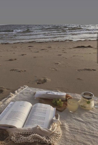 Reading on the beach allows you to immerse in captivating stories, unwind, and connect with nature