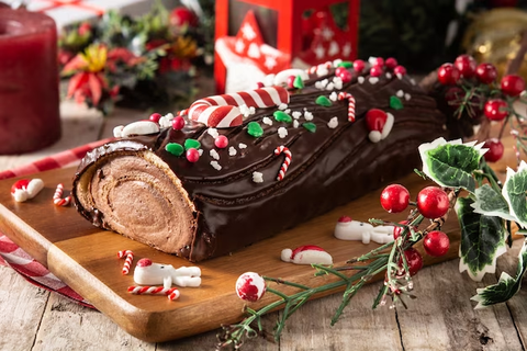 Sweet rolled cake resembling a winter log