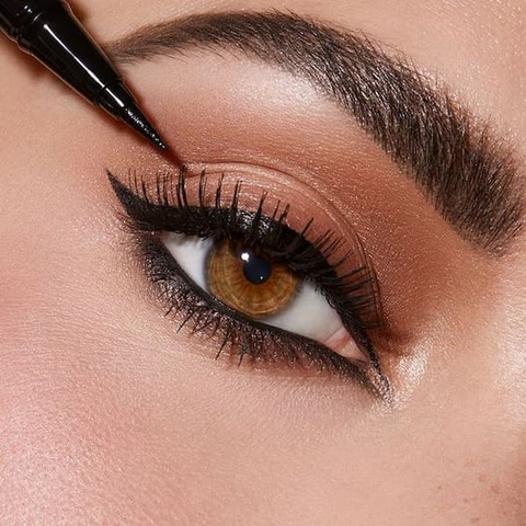 For a classic fall look, go for warm, earthy eyeshadow shades like browns, coppers, and golds.