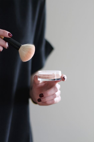 Choose the right setting powder and tools, like a brush or sponge, to match your skin tone and needs
