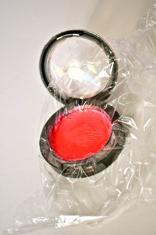 Reassemble the blush, then press it down evenly