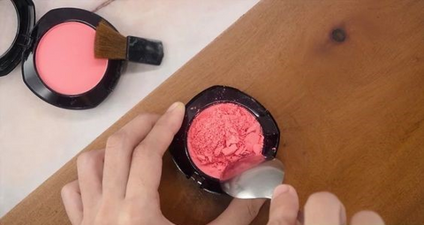 Carefully crush the blush's remnants into a fine powder-like consistency