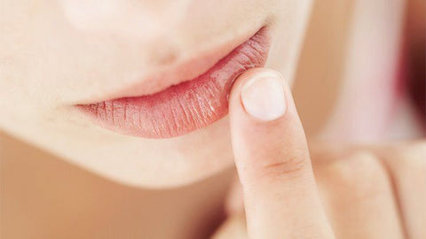 Lack of proper hydration can cause dry and chapped lips