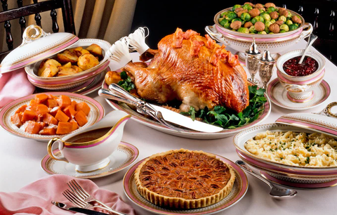 Feasting on a traditional Thanksgiving meal, with loved ones gathered, is a cherished tradition