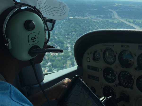 Hobbs Flyer Pilot with wearing a David Clark H10-13.4 Headset flying a Cessna 172 Skyhawk