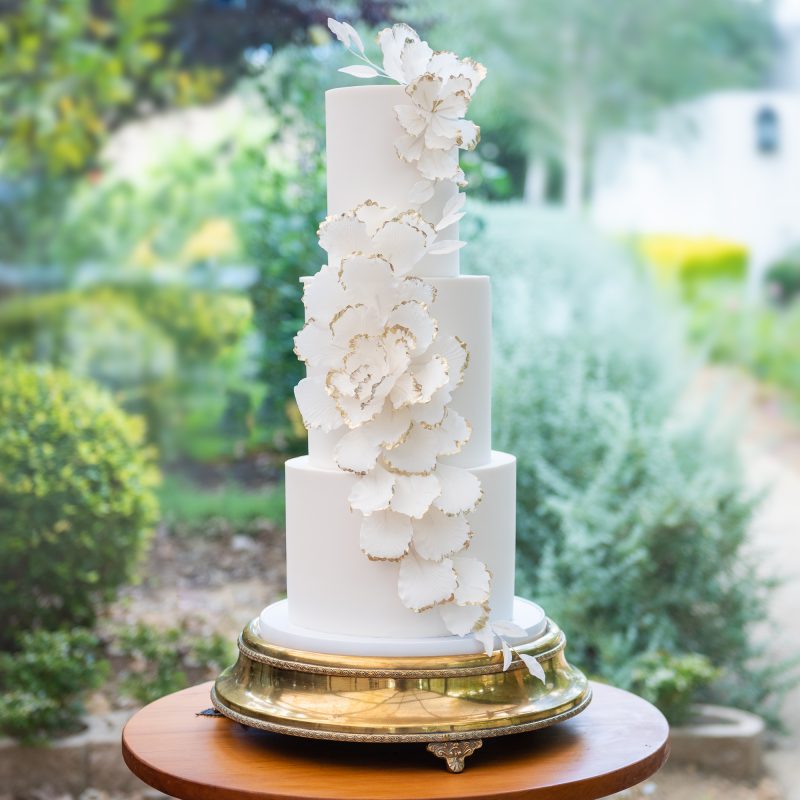 Bride and groom cuts with knife white big beautiful wedding cake Stock  Photo - Alamy
