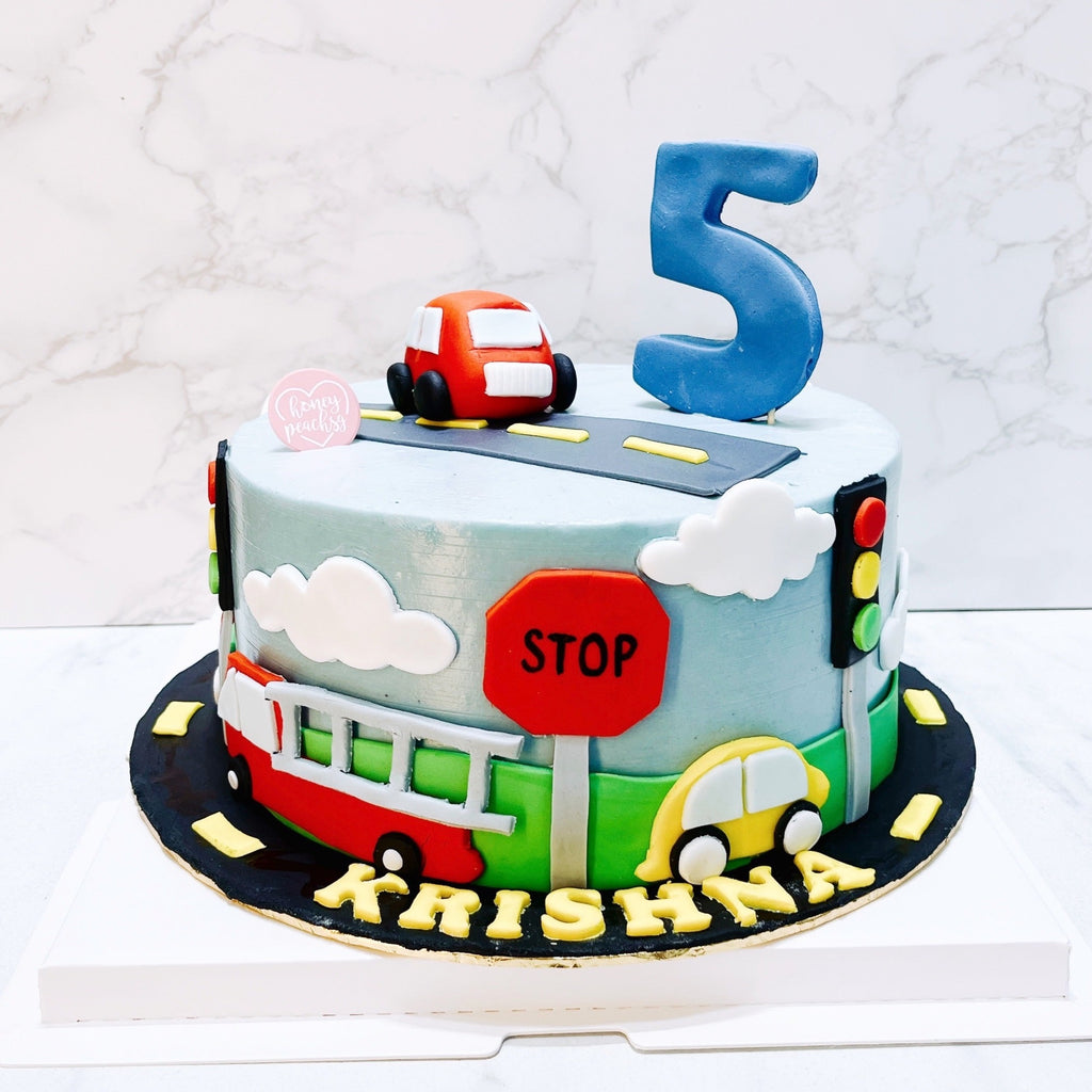 Birthday colorful cake for little boy with toy cars and colorful candies  decorations. Holiday, celebration, stylish concept. Construction and  transportation theme boys party. Stock Photo | Adobe Stock