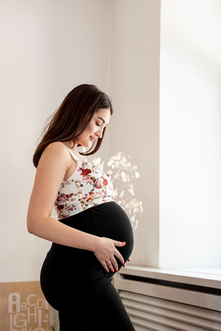 maternity photoshoot in a maternity dress
