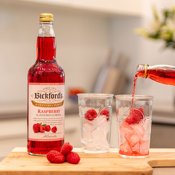 Bickford's raspberry cordial being poured into a cup