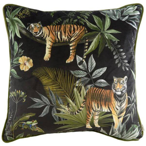 A black jungle style cushion with a printed design of tigers and jungle foliage