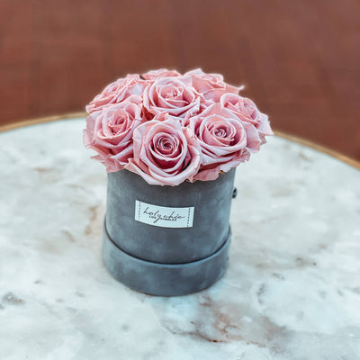 Forever roses in a suede small round box