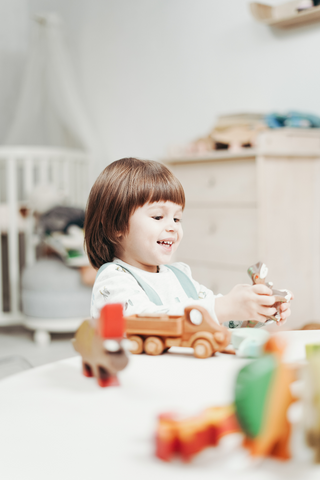 Children play with Lego versus montessori materials