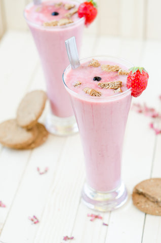 pink smoothie in tall glasses to convey healthy snacks and lunches