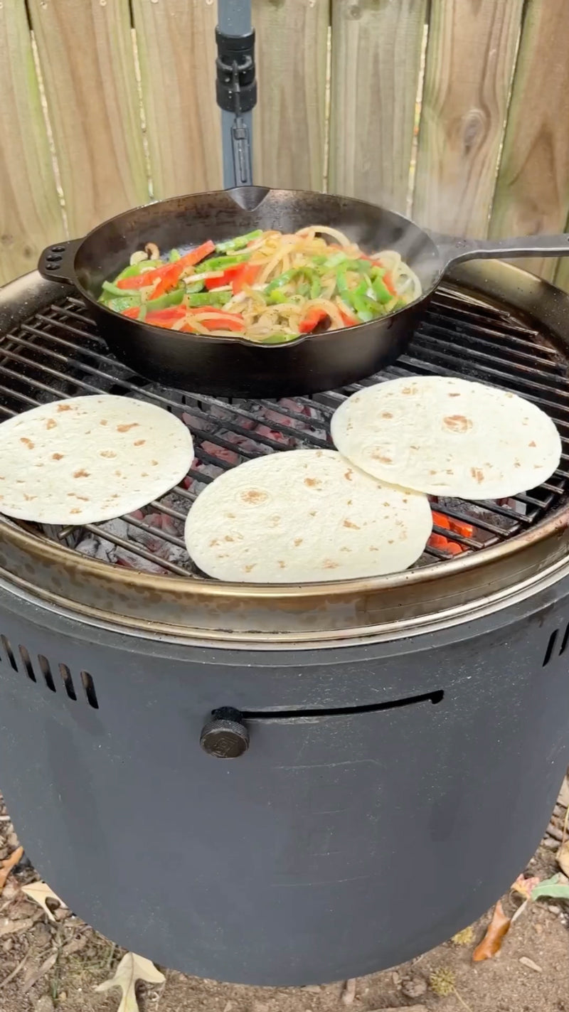 Sauted vegetables and grill toasted flour tortillas for flat iron steak fajitas