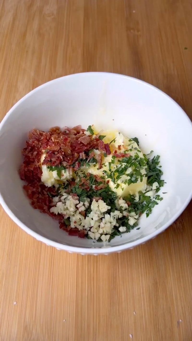 Steakhouse compound butter with softened butter, chopped bacon, chives, parsley, garlic, salt and pepper