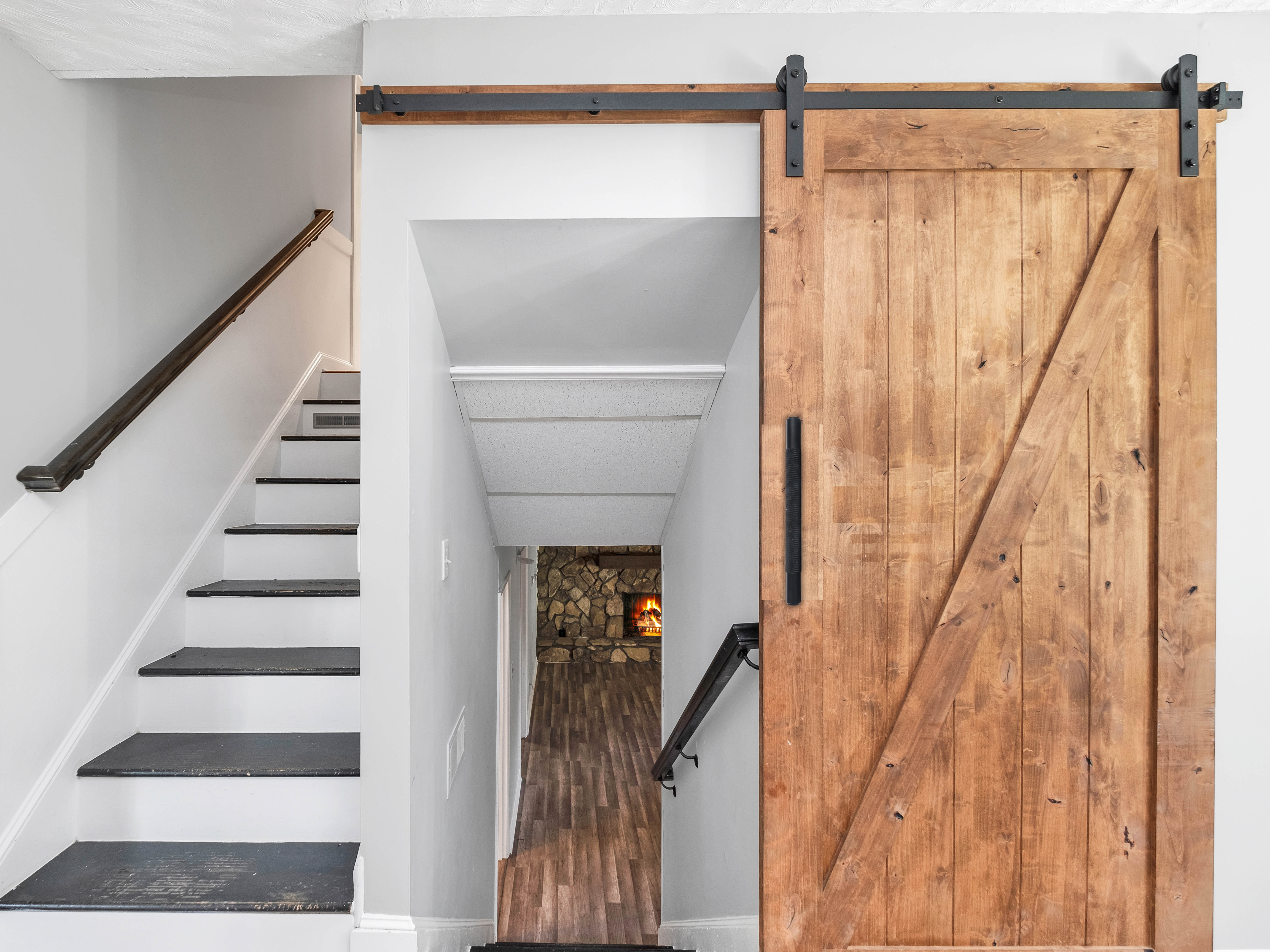 Sliding barn door with door pull compact living space