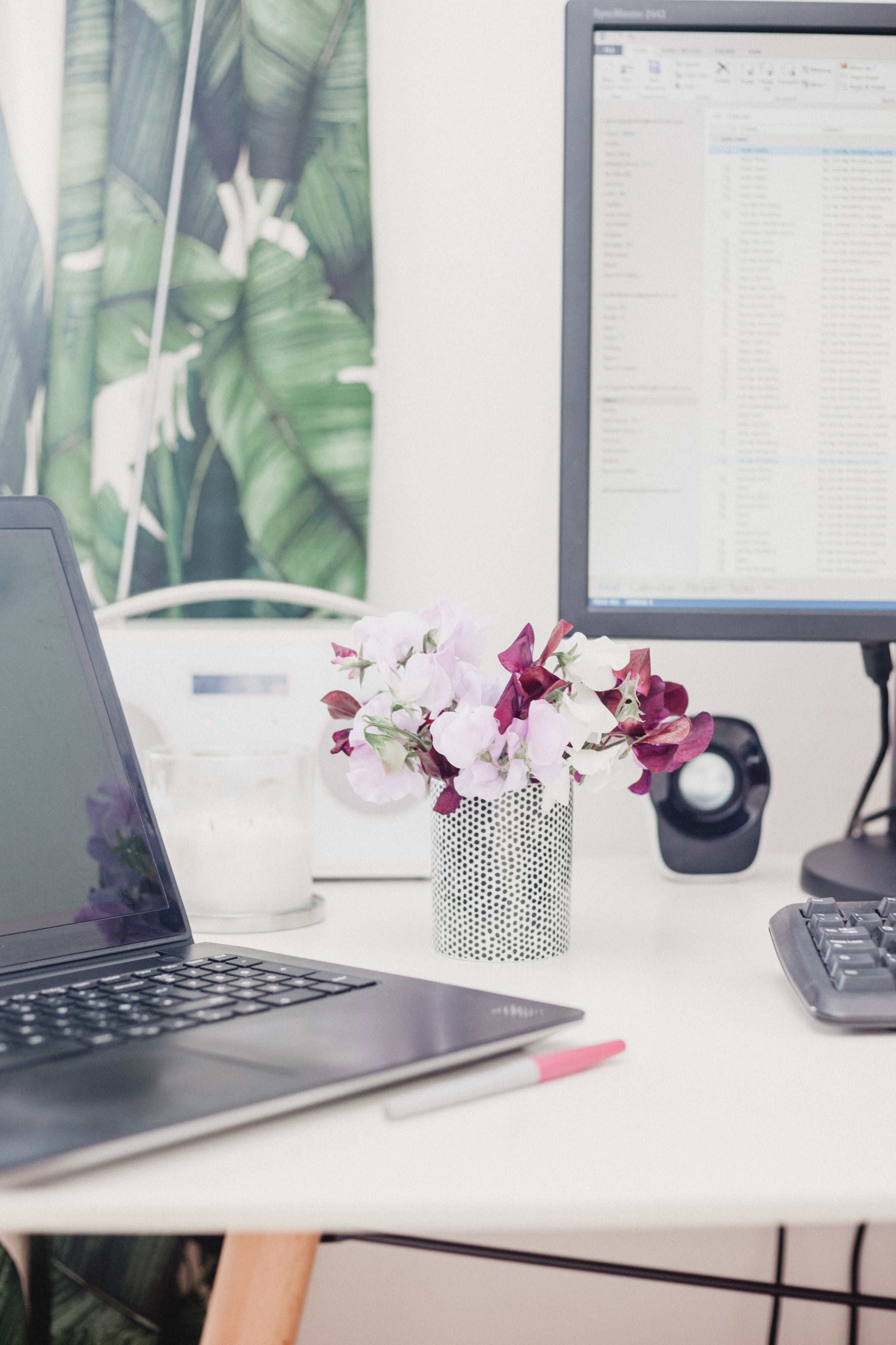 desktop work space decorated and organized decluttered