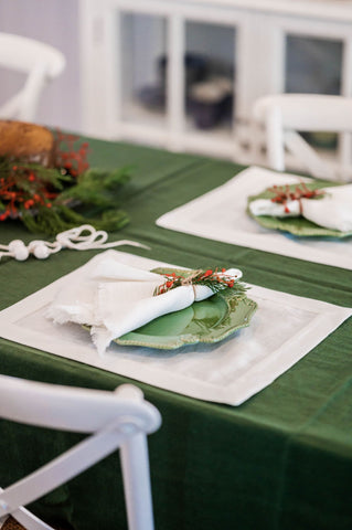 Moss green linen tablecloth and rustic white napkins - LinenBarn