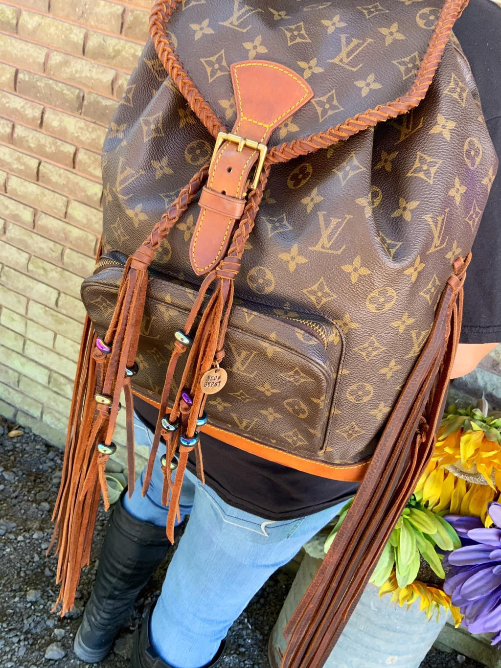 louis vuitton backpack with fringe