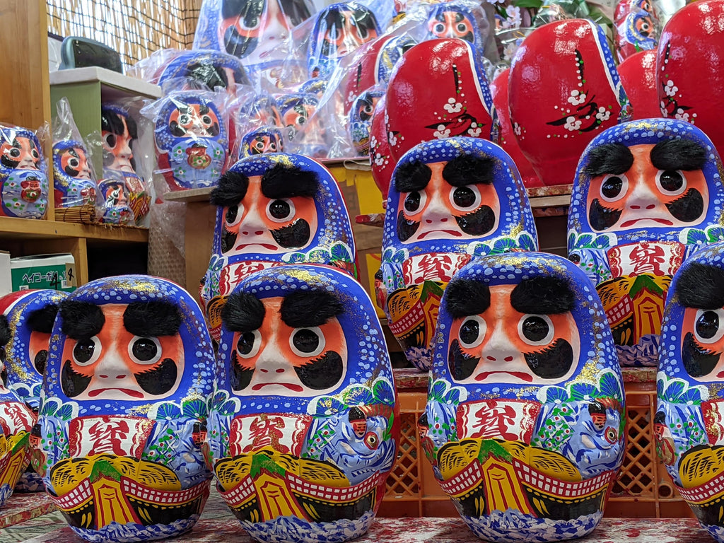 Rows of handmade Matsukawa Daruma dolls native to Sendai, Miyagi, Japan