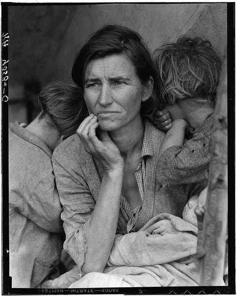 Photo showing migrant mother and children by the side of the road in California in 1936