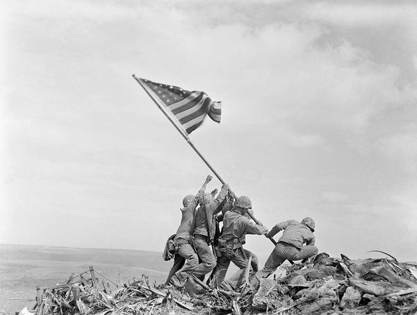 Photograph showing marines raising The Flag On Iwo Jima By Joe Rosenthal, 1945 