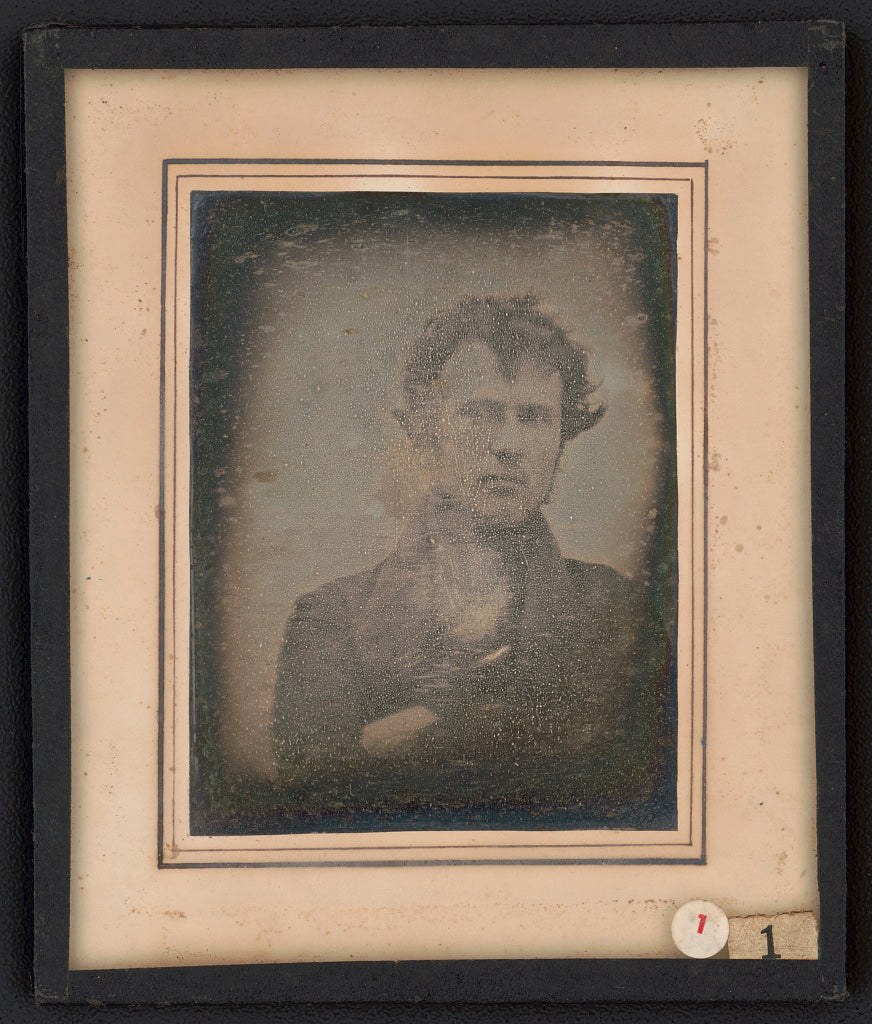 The first 'selfie' photograph, showing American Robert Cornelius in 1839, peering at the camera, uncertain
