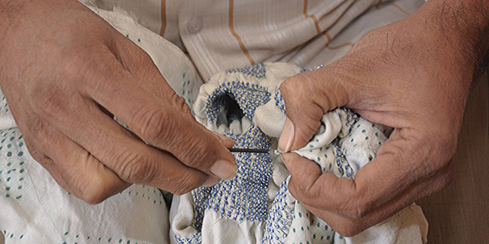Bandhani knotting on gaji silk fabric in process