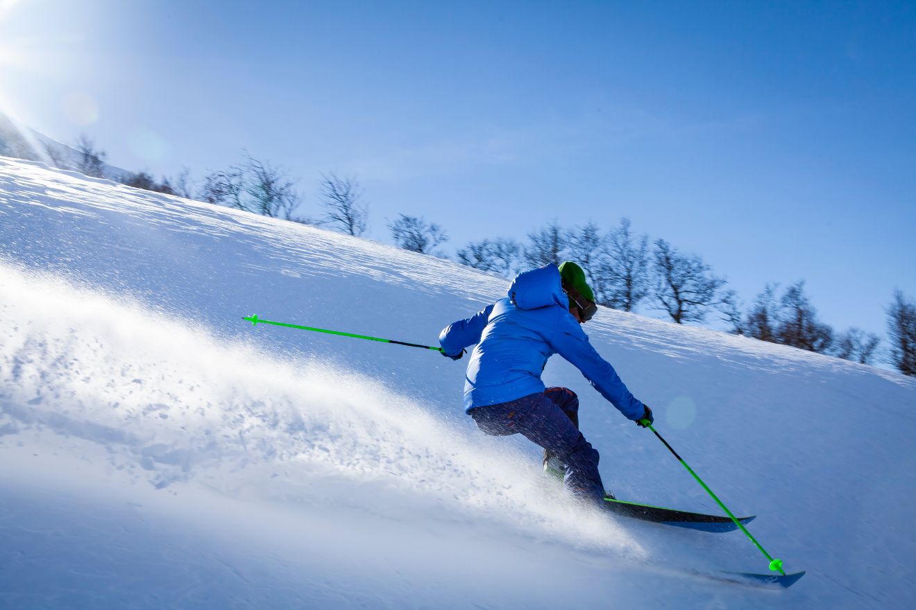 Man downhill skiing