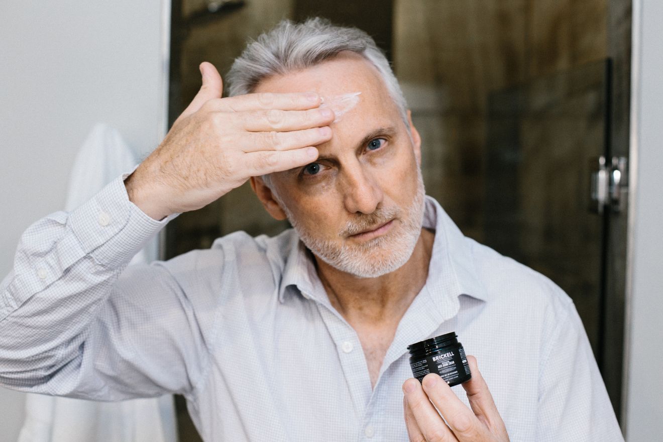 Man applying face cream