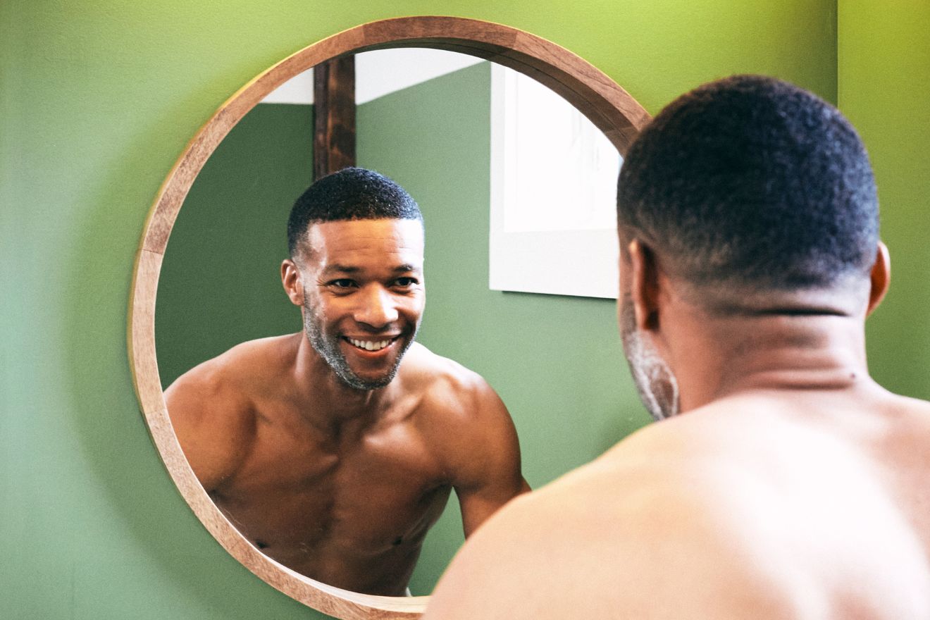 Man looking in mirror