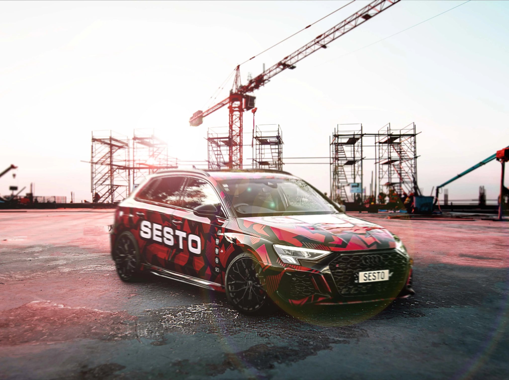 Audi RS3 with Sesto Fasteners graphics in a construction site. 