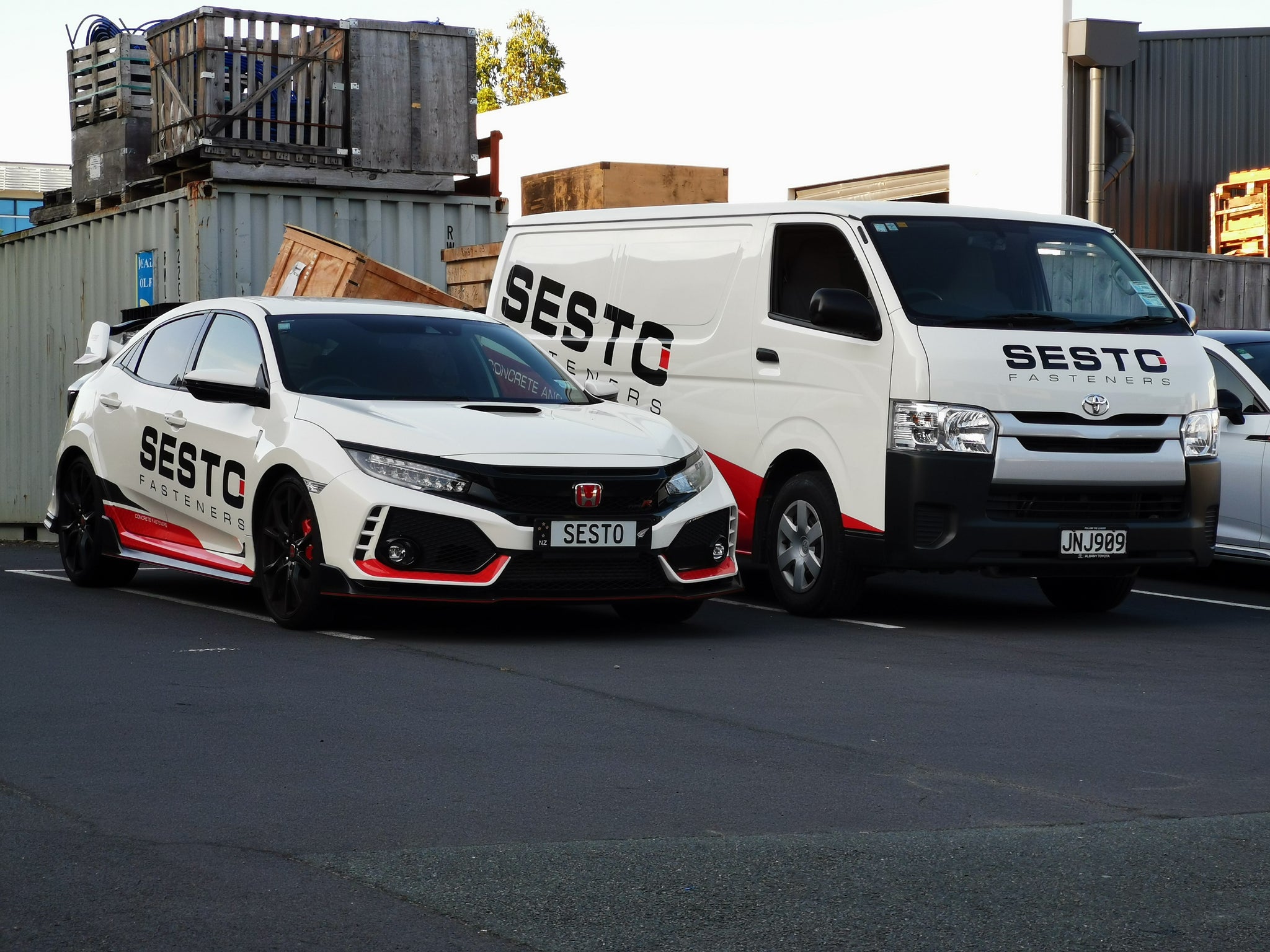 Honda Civic Type R with Sesto Fasteners decals parked front angle view.