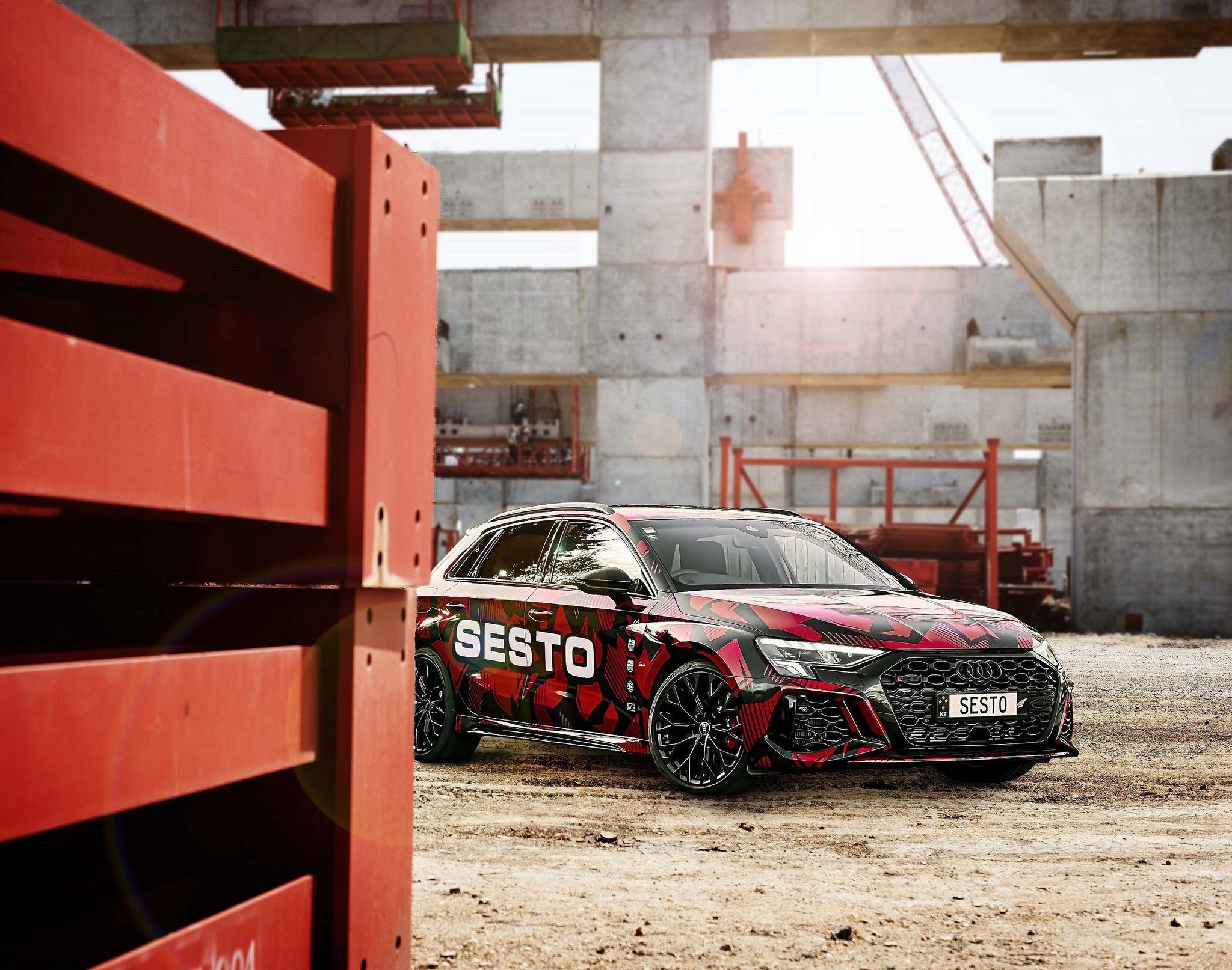 Audi RS3 with Sesto Fasteners in construction site, front view.
