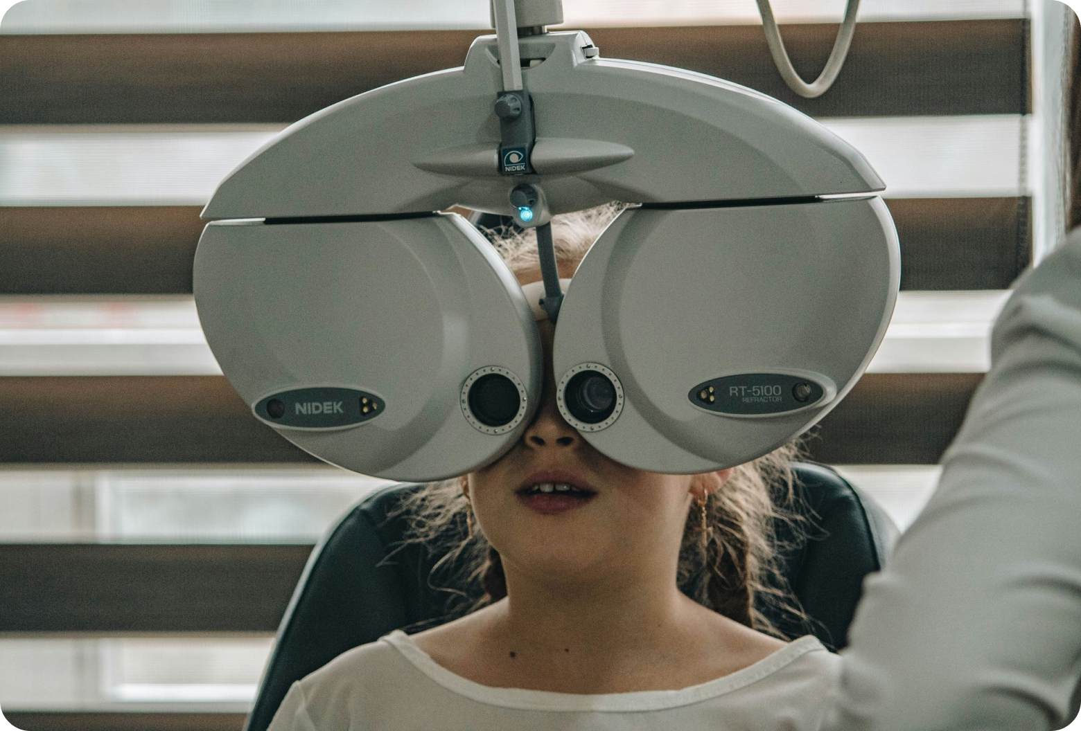 Child being assessed by an optometrist