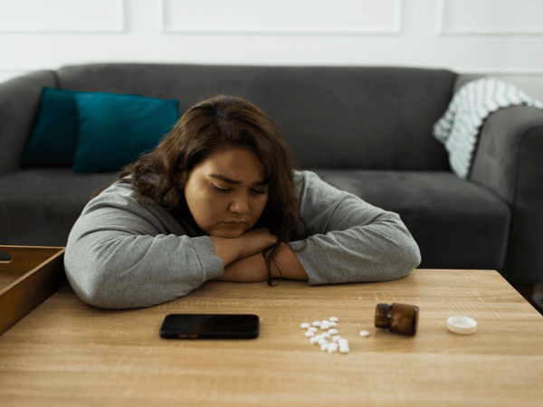 an image of a woman experiencing drug abuse.