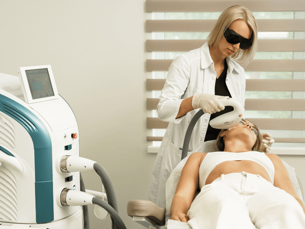 an image of a woman undergoing IPL treatment