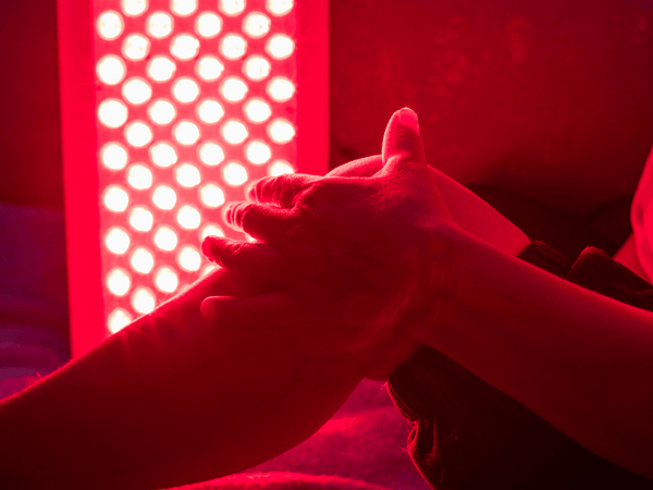 An image of a man under going red light treatment