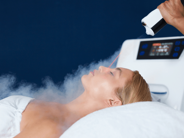 a woman undergoing cryotherapy.