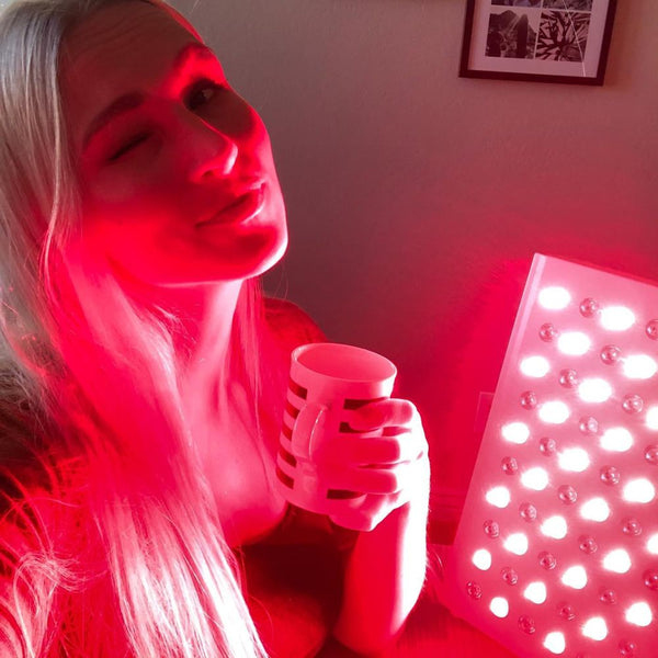 An image of a woman getting red light therapy