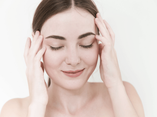 an image of a woman with healthy skin.