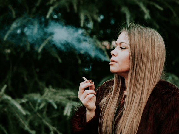 an image of a woman smoking