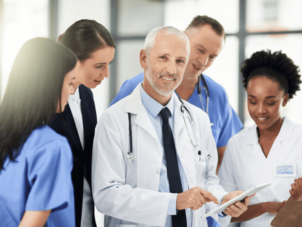 A group of medical practitioners smiling