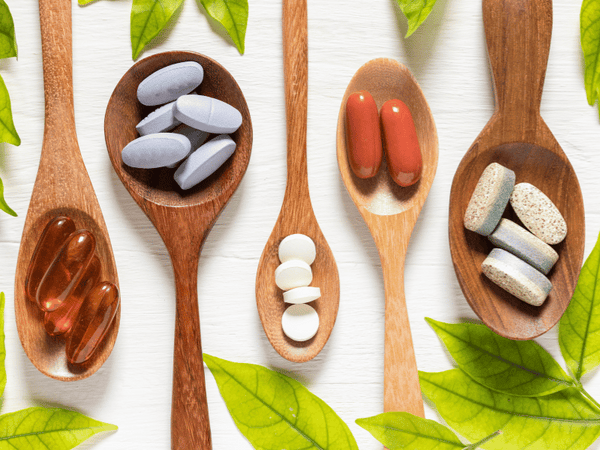 an image of different vitamins and supplements
