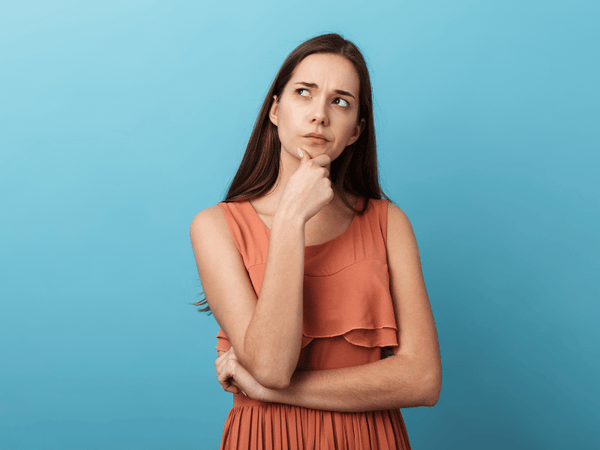 an image of a Woman Thinking hard